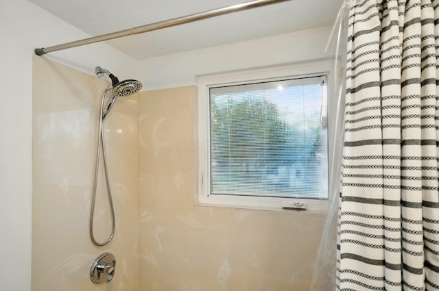 bathroom view of curtained shower