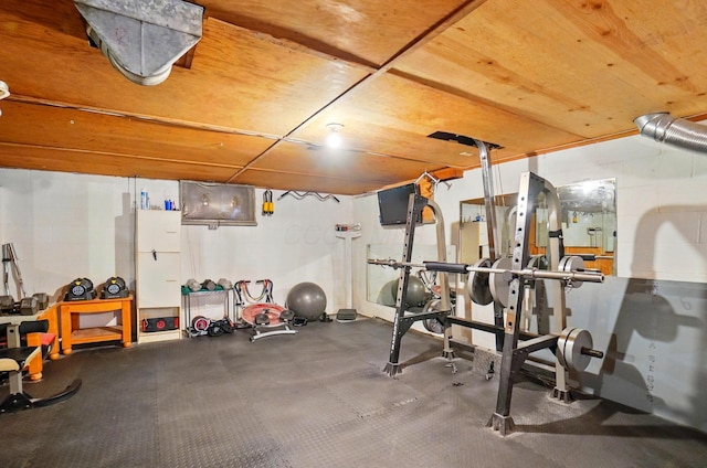 workout area with wooden ceiling