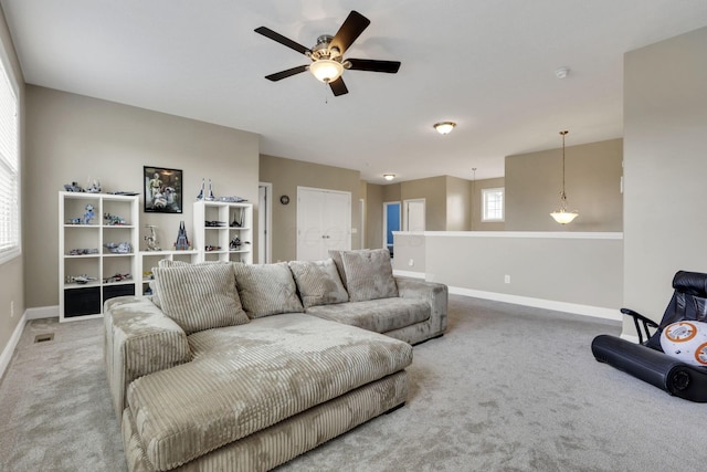4919 Nadine Park Dr, Hilliard, OH 43026 - living area featuring carpet flooring, baseboards, and a ceiling fan