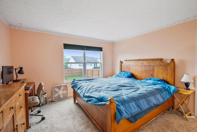 119 Harvard Loop, Delaware, OH 43015 - carpeted bedroom with crown molding, baseboards, a textured ceiling, and an office area