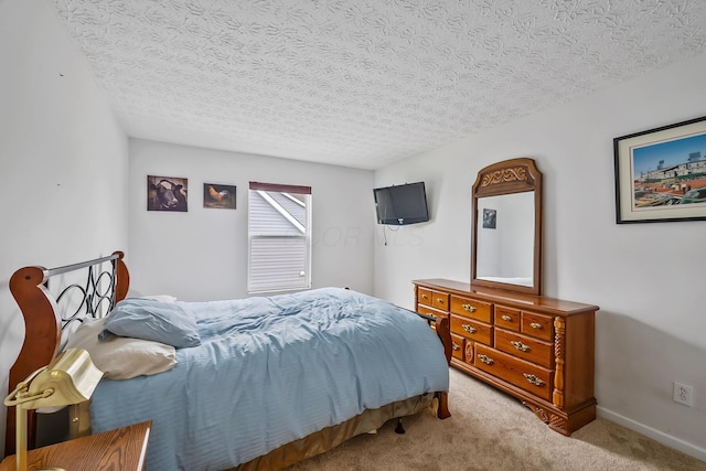 119 Harvard Loop, Delaware, OH 43015 - bedroom featuring carpet and a textured ceiling