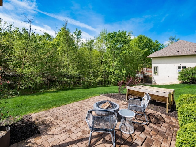 9378 Pine Creek Dr, Powell, OH 43065 - view of patio with an outdoor fire pit