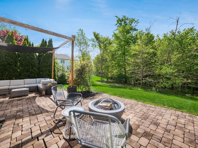 9378 Pine Creek Dr, Powell, OH 43065 - view of patio / terrace with an outdoor living space with a fire pit