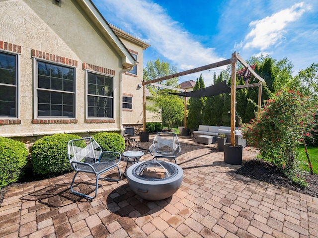9378 Pine Creek Dr, Powell, OH 43065 - view of patio featuring an outdoor living space with a fire pit