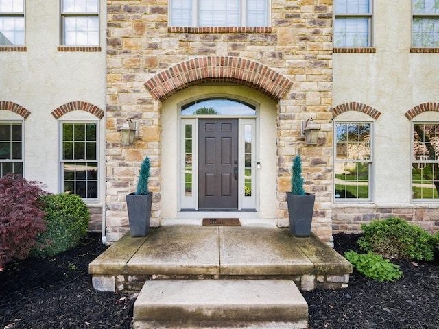 9378 Pine Creek Dr, Powell, OH 43065 - view of exterior entry with stone siding