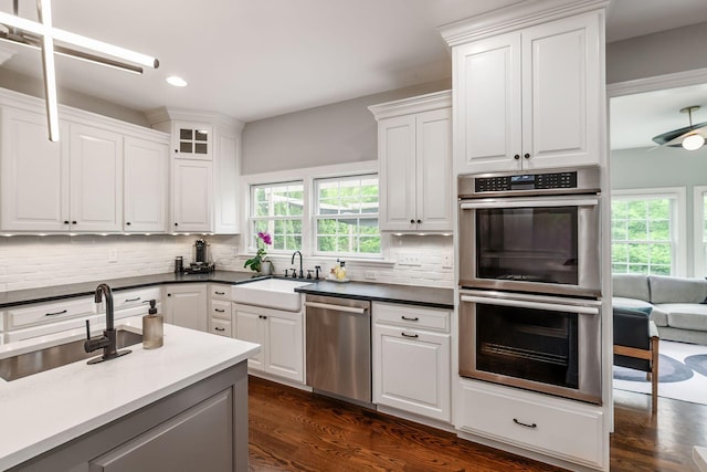 9378 Pine Creek Dr, Powell, OH 43065 - kitchen featuring stainless steel appliances, a sink, recessed lighting, and decorative backsplash
