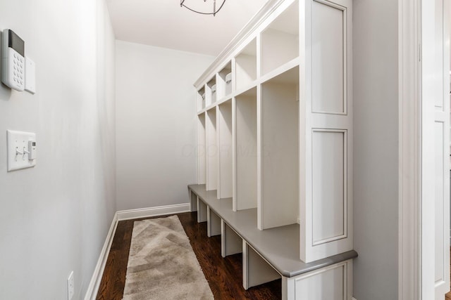 9378 Pine Creek Dr, Powell, OH 43065 - mudroom featuring dark wood-type flooring and baseboards