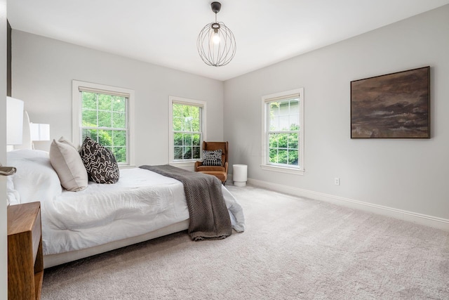 9378 Pine Creek Dr, Powell, OH 43065 - bedroom with baseboards and carpet flooring