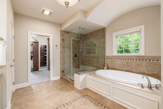 9378 Pine Creek Dr, Powell, OH 43065 - bathroom with a shower stall, a bath, and tile patterned flooring