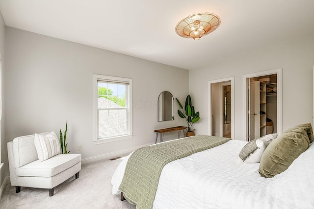9378 Pine Creek Dr, Powell, OH 43065 - bedroom featuring carpet, baseboards, and a spacious closet