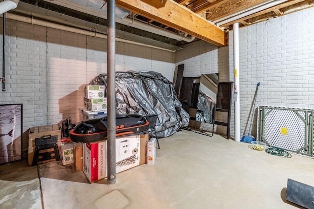 9378 Pine Creek Dr, Powell, OH 43065 - unfinished below grade area with brick wall