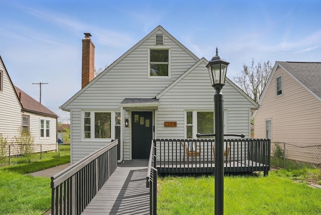 view of front of house with a wooden deck