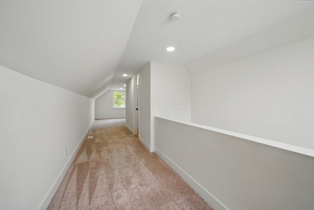 bonus room with lofted ceiling, carpet flooring, baseboards, and recessed lighting