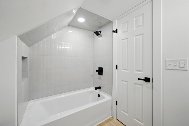 full bathroom with shower / tub combination and wood finished floors