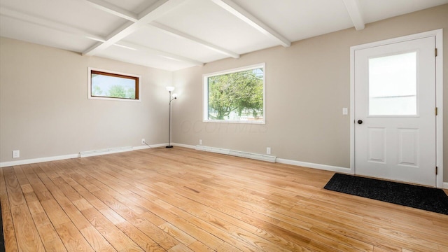 255 S Preston St, Centerburg, OH 43011 - spare room featuring light wood-style flooring, beam ceiling, baseboard heating, and baseboards