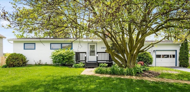 255 S Preston St, Centerburg, OH 43011 - view of front facade with an attached garage, a front yard, and driveway