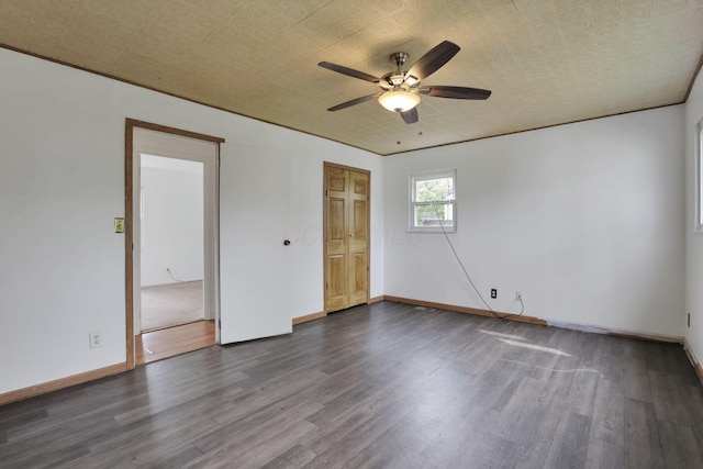 315 Redmond Rd, Columbus, OH 43228 - unfurnished room featuring dark wood-style floors, ceiling fan, and baseboards