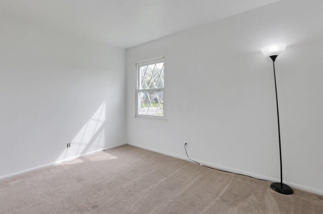 315 Redmond Rd, Columbus, OH 43228 - carpeted spare room with baseboards
