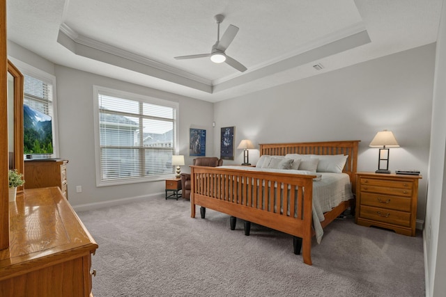 6678 Trinity Mist Way, Delaware, OH 43015 - bedroom with a raised ceiling, crown molding, multiple windows, carpet floors, and baseboards