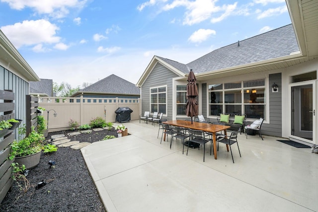 6678 Trinity Mist Way, Delaware, OH 43015 - view of patio / terrace featuring fence, grilling area, and outdoor dining area