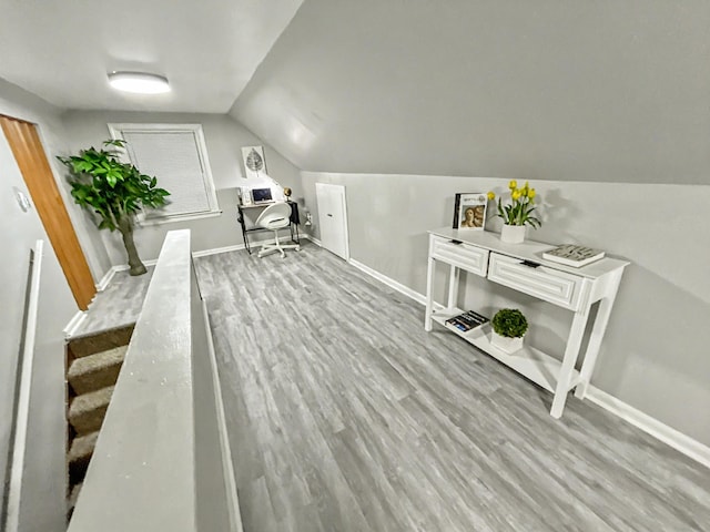 2322 Mecca Rd, Columbus, OH 43224 - office space with wood finished floors, baseboards, and lofted ceiling