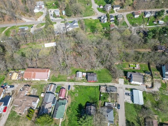 aerial view of property's location featuring nearby suburban area