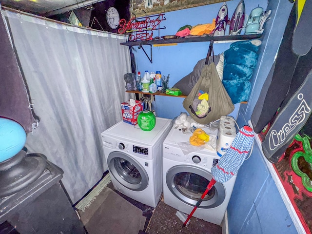 laundry room with independent washer and dryer