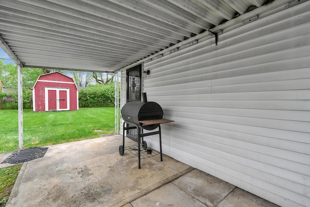 view of patio featuring a shed and an outdoor structure