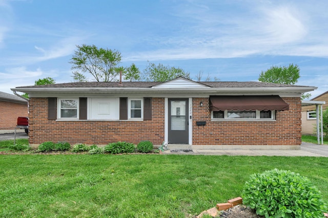 view of front of home featuring brick siding