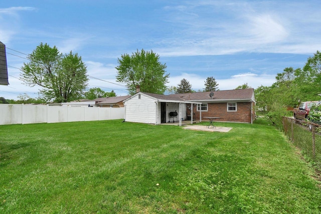 back of house featuring a patio area and brick siding