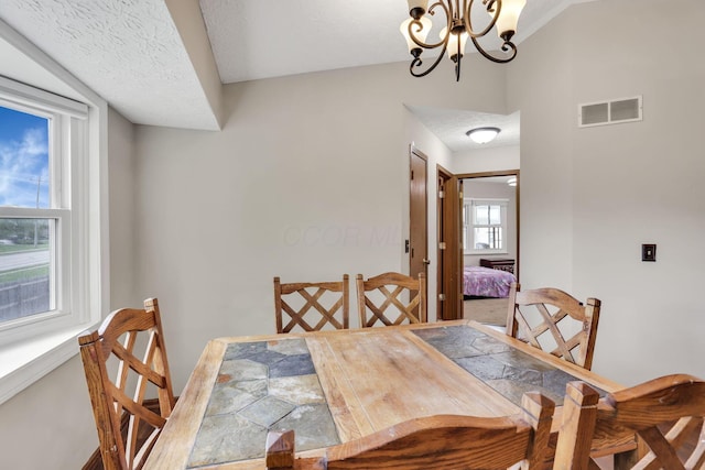 7170 Daugherty Dr, Reynoldsburg, OH 43068 - dining space featuring a chandelier