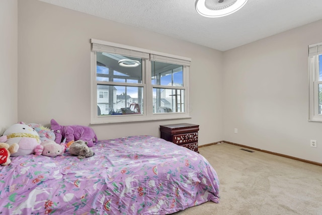 7170 Daugherty Dr, Reynoldsburg, OH 43068 - bedroom featuring carpet, baseboards, and a textured ceiling