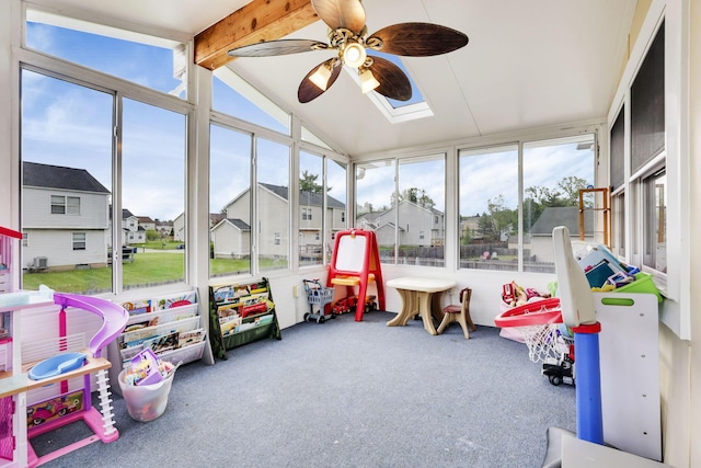 7170 Daugherty Dr, Reynoldsburg, OH 43068 - sunroom with a ceiling fan, carpet floors, a residential view, and a skylight