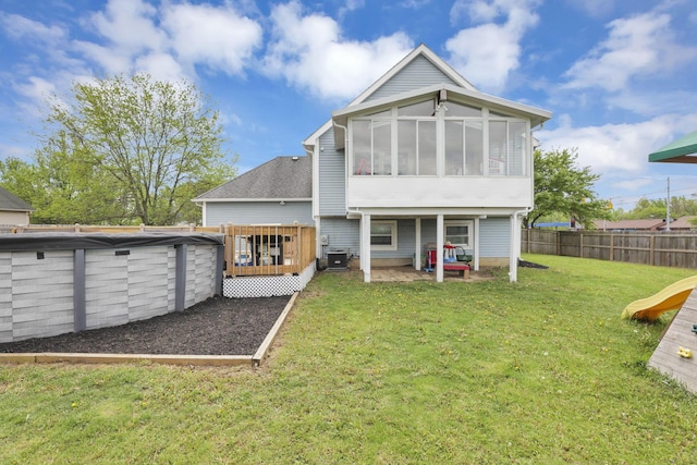 7170 Daugherty Dr, Reynoldsburg, OH 43068 - rear view of property with a sunroom and cooling unit