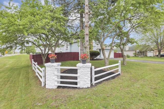 7170 Daugherty Dr, Reynoldsburg, OH 43068 - view of front facade with asphalt driveway and a garage