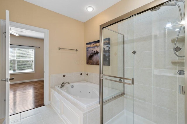 6575 Wensley Ct, Westerville, OH 43082 - full bathroom with a shower stall, tile patterned flooring, a whirlpool tub, baseboards, and ceiling fan