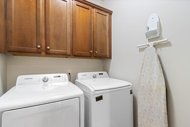 6575 Wensley Ct, Westerville, OH 43082 - laundry room with washing machine and clothes dryer and cabinet space