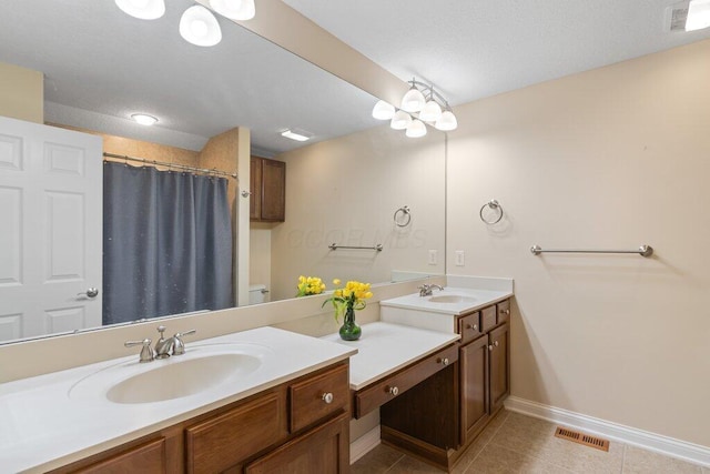 6575 Wensley Ct, Westerville, OH 43082 - bathroom with baseboards, tile patterned floors, double vanity, and curtained shower