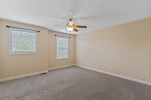 6575 Wensley Ct, Westerville, OH 43082 - empty room featuring a ceiling fan, carpet flooring, and baseboards