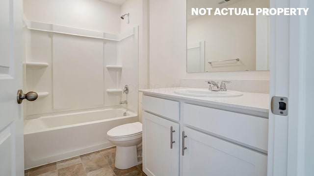 1773 Jacko Ln, Circleville, OH 43113 - bathroom featuring vanity, toilet,  shower combination, and stone finish flooring