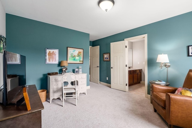 office with light carpet and baseboards