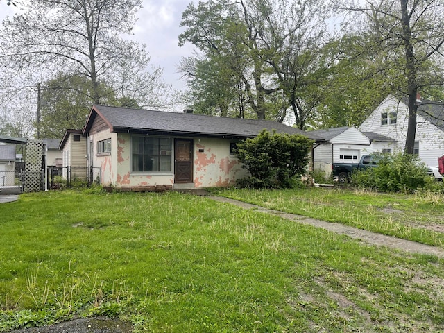 view of front of house with a shingled roof