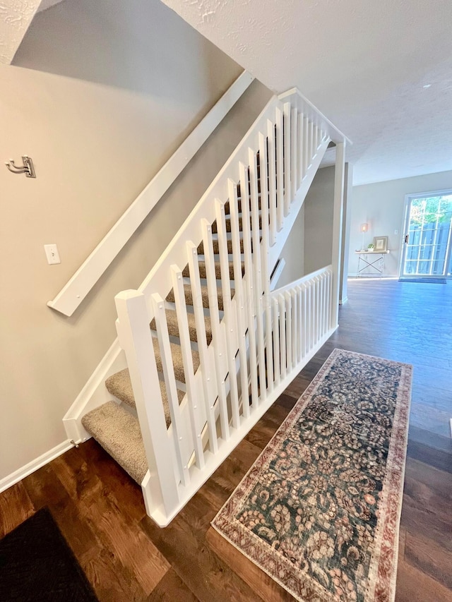755 Parkbluff Way, Lewis Center, OH 43035 - stairway with wood finished floors and baseboards