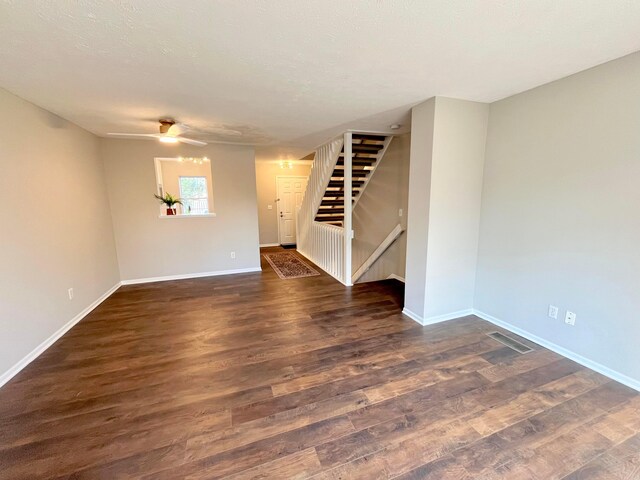 755 Parkbluff Way, Lewis Center, OH 43035 - unfurnished living room featuring baseboards, stairway, and wood finished floors