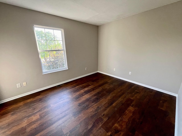 755 Parkbluff Way, Lewis Center, OH 43035 - empty room with dark wood-type flooring and baseboards