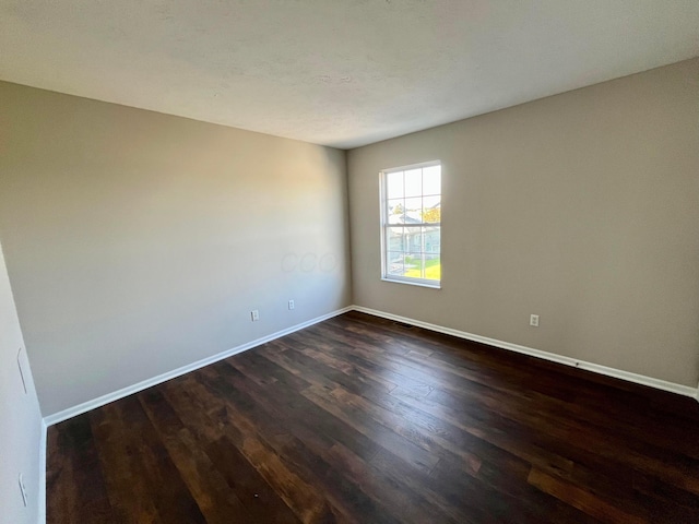 755 Parkbluff Way, Lewis Center, OH 43035 - spare room featuring dark wood finished floors and baseboards