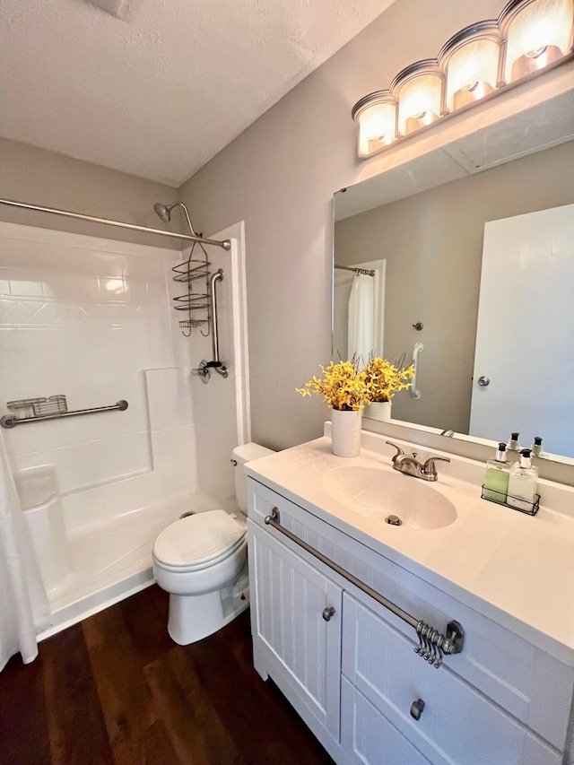 755 Parkbluff Way, Lewis Center, OH 43035 - bathroom with wood finished floors, vanity, a shower with shower curtain, and toilet
