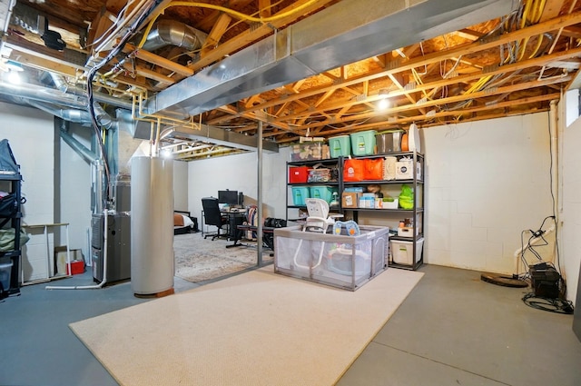 unfinished below grade area with concrete block wall and an office area