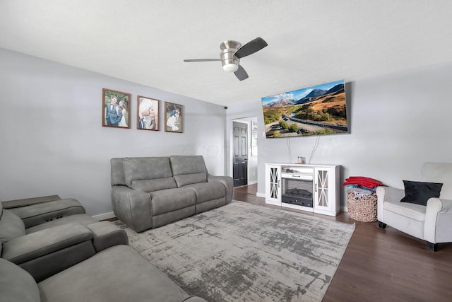 509 Section Line Dr, South Charleston, OH 45368 - living room featuring ceiling fan, wood finished floors, and baseboards