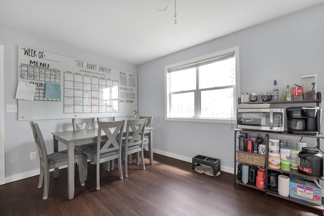 509 Section Line Dr, South Charleston, OH 45368 - dining room featuring wood finished floors and baseboards